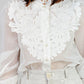 BLUSA BLANCA CON APLICACIONES
