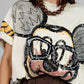 BLUSA ESTAMPADA OVERSIZE