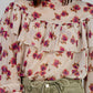 BLUSA ESTAMPADA CON VOLANTES