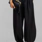 PANTALON CON PINZAS ELEGANTE
