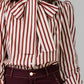 BLUSA ESTAMPADA CON LAZO