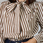 BLUSA ESTAMPADA CON LAZO