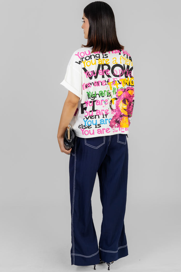 BLUSA ESTAMPADA CON PEDRERÍA
