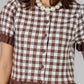 BLUSA A CUADROS CON VOLADOS