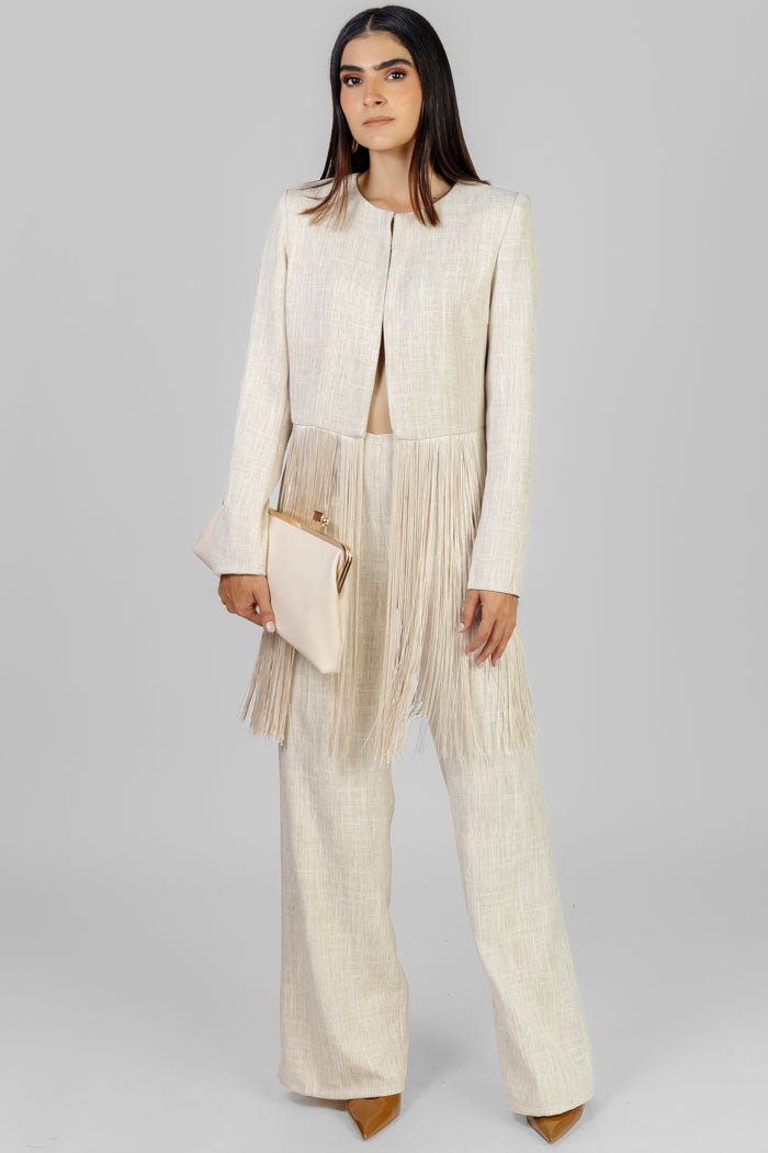 CONJUNTO BEIGE CON FLECOS