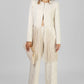 CONJUNTO BEIGE CON FLECOS