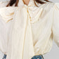 BLUSA CREMA CON LAZO