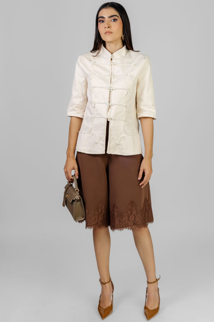 BLUSA CREMA DETALLE PERLAS