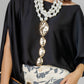 BLUSA NEGRA ASIMÉTRICA