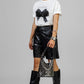 PLAYERA MOÑOS NEGRO